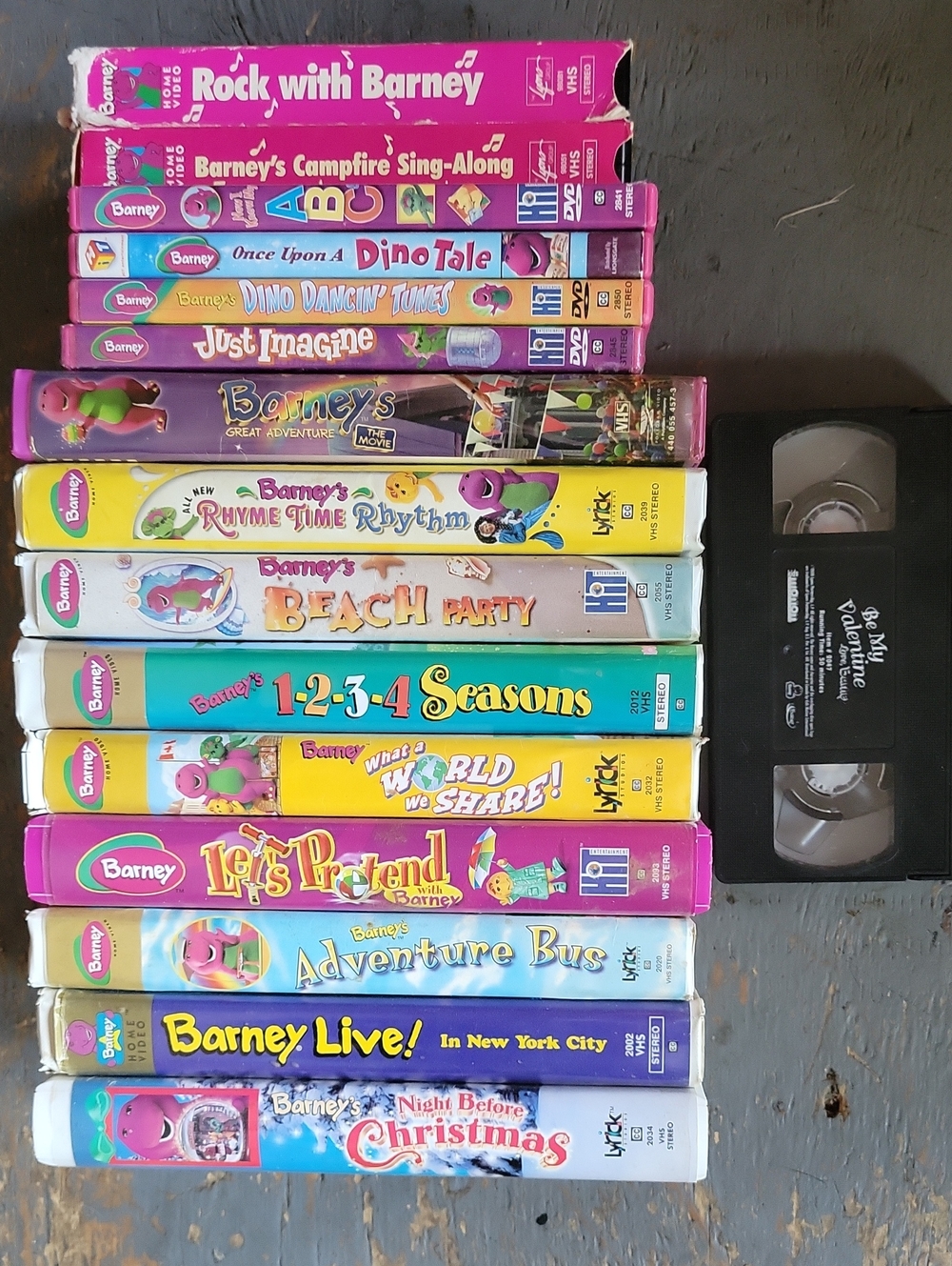 Barney VHS/DVD Collection — Bright Multicolor Spines/Colored Tapes